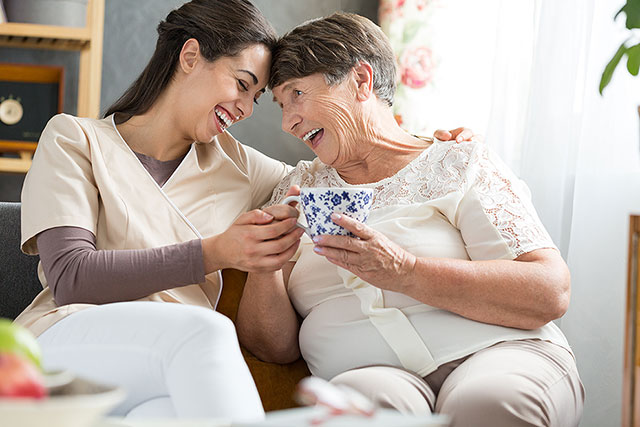 Nurse and Patient having tea