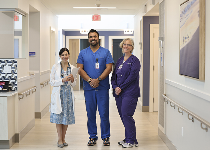 three medical professionals